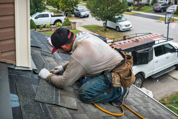 Professional Roof Replacement technician working in South Freeport, ME